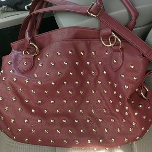 Faux leather red studded bag